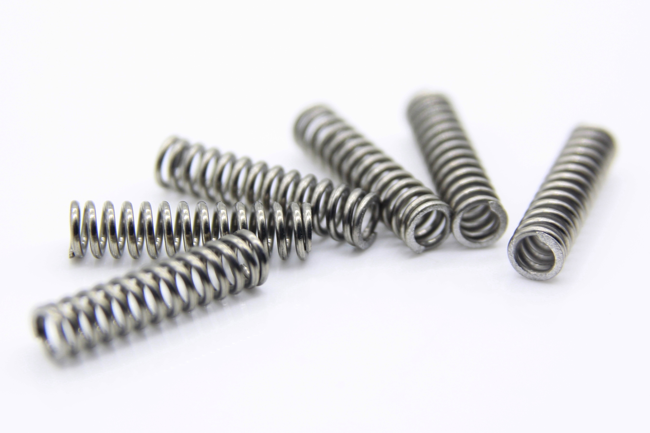 决定弹簧的质量因素